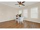Bright dining area with hardwood floors and multiple windows for natural light at 6218 Old Stilesboro Nw Rd, Acworth, GA 30101