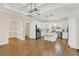 Open kitchen featuring white cabinets, a center island with seating, and modern appliances at 6218 Old Stilesboro Nw Rd, Acworth, GA 30101