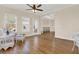 Spacious living room showcasing hardwood floors, access to the outdoors, and a comfortable seating area at 6218 Old Stilesboro Nw Rd, Acworth, GA 30101