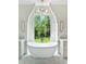 Bright bathroom with soaking tub, dual vanities, large window with view and herringbone floor at 6428 East Cherokee Dr, Canton, GA 30115