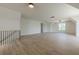 Spacious bonus room with hardwood flooring, natural light, and neutral walls at 6428 East Cherokee Dr, Canton, GA 30115