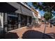 Street view of a brewery with outdoor seating on a brick walkway at 6428 East Cherokee Dr, Canton, GA 30115