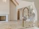 Close-up of a modern kitchen faucet with a marble countertop and view of the staircase at 6428 East Cherokee Dr, Canton, GA 30115