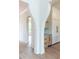 View of the kitchen showing custom cabinetry, marble backsplash, and wood floors at 6428 East Cherokee Dr, Canton, GA 30115