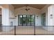 Cozy porch with black railings offering a view of the manicured backyard at 6428 East Cherokee Dr, Canton, GA 30115