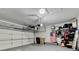 Well-organized garage space with shelving and storage, perfect for tools and equipment at 7435 Jamestown Dr, Alpharetta, GA 30005