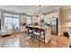 Bright kitchen with stainless steel appliances, granite countertops, and island seating, perfect for casual dining and entertaining at 7435 Jamestown Dr, Alpharetta, GA 30005