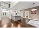Open floor plan featuring hardwood floors, modern lighting and spacious living area at 125 Forrest Lake Rd, Johns Creek, GA 30022