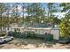 Charming lakefront restaurant features ample parking and a scenic lakeside setting at 135 Marina Ct, Canton, GA 30114