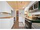Kitchen featuring stainless steel appliances, counter space, and ample storage at 135 Marina Ct, Canton, GA 30114