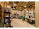 Spacious unfinished basement area with exposed ceilings, shelving, and ample room for storage at 3180 Lee Dr, Buford, GA 30518