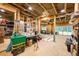 Unfinished basement with exposed beams, concrete floor and framing throughout at 3180 Lee Dr, Buford, GA 30518