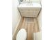 Charming bathroom vanity with white countertop, stylish fixtures, and wood-look flooring at 3180 Lee Dr, Buford, GA 30518