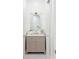 Stylish bathroom features a vanity with marble countertop and modern light fixture at 3180 Lee Dr, Buford, GA 30518