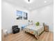 bedroom featuring hardwood floors, and a large window at 3180 Lee Dr, Buford, GA 30518