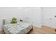 bedroom with hardwood floors and ample storage at 3180 Lee Dr, Buford, GA 30518