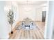 Bright dining room featuring a large window and a modern chandelier at 3180 Lee Dr, Buford, GA 30518