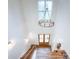 Two story foyer with a chandelier, wood front door, and staircase at 3180 Lee Dr, Buford, GA 30518