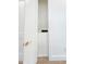 Hallway closet features a modern gold handle at 3180 Lee Dr, Buford, GA 30518