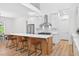 Bright kitchen with large island and stainless steel appliances, perfect for entertaining at 3180 Lee Dr, Buford, GA 30518