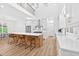 Bright open kitchen showcasing modern finishes, an island, and stainless steel appliances at 3180 Lee Dr, Buford, GA 30518