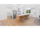 Modern kitchen with stainless steel appliances, a center island, and white cabinetry for a clean, contemporary aesthetic at 3180 Lee Dr, Buford, GA 30518