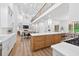Modern kitchen with stainless steel appliances and a professional grade stove and oven at 3180 Lee Dr, Buford, GA 30518