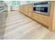 New kitchen includes stainless steel appliances and custom island with seating at 3180 Lee Dr, Buford, GA 30518