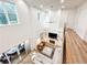 Aerial view of the living room with tall ceilings, fireplace and large windows at 3180 Lee Dr, Buford, GA 30518
