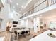 Open-concept living area with high ceilings and ample natural light throughout at 3180 Lee Dr, Buford, GA 30518