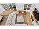 Bright living room featuring a modern sectional, light hardwood floors, and large sliding glass doors at 3180 Lee Dr, Buford, GA 30518