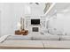 Inviting living room features soaring ceilings, a fireplace with built-ins, and a large sectional sofa for relaxing at 3180 Lee Dr, Buford, GA 30518
