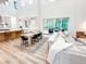 Bright living area with access to chef's kitchen and views of the backyard at 3180 Lee Dr, Buford, GA 30518