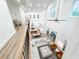 Open concept living space with modern kitchen, living room, dining area, and lots of windows at 3180 Lee Dr, Buford, GA 30518