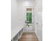 Mud room boasts practical built-in bench seating and easy access to the outdoors at 3180 Lee Dr, Buford, GA 30518