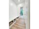 Hallway featuring a bench with built in storage with an entrance to the backyard at 3180 Lee Dr, Buford, GA 30518