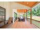 Covered patio features wood ceiling, outdoor furniture, ceiling fan and a view of the backyard at 3180 Lee Dr, Buford, GA 30518