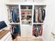 Custom walk-in closet features built-in shelving, drawers, rods, and ample space for organizing shoes and clothing at 3180 Lee Dr, Buford, GA 30518