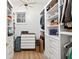 Organized walk-in closet with custom shelving, drawers, and ample storage for clothing and accessories at 3180 Lee Dr, Buford, GA 30518
