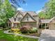 Charming two-story home with neutral paint and landscaped yard at 8170 Hurakan Creek Xing, Cumming, GA 30028