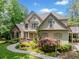 Charming two-story home with neutral paint and landscaped yard at 8170 Hurakan Creek Xing, Cumming, GA 30028