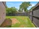 Grassy backyard featuring privacy fence and brick patio area; perfect for entertaining at 892 Wayland Ct, Smyrna, GA 30080