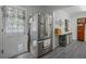 Kitchen featuring a stainless steel refrigerator, gray walls, and gray flooring at 892 Wayland Ct, Smyrna, GA 30080