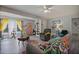 Bright living room featuring neutral walls, wood laminate flooring, and cozy furnishings for relaxation at 892 Wayland Ct, Smyrna, GA 30080