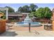 Smyrna Market Village's water feature surrounded by lush greenery and nearby restaurants at 892 Wayland Ct, Smyrna, GA 30080
