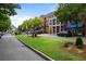 Street view of Smyrna Market Village with shops, restaurants, and well-manicured green space at 892 Wayland Ct, Smyrna, GA 30080
