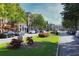 Street view of Smyrna Market Village with shops, flowers, and lush greenery at 892 Wayland Ct, Smyrna, GA 30080