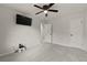 Spacious bedroom with a ceiling fan and neutral walls and carpet at 111 Northdale Pl, Lawrenceville, GA 30046
