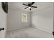 Bedroom with a window, a ceiling fan, neutral walls, and carpet at 111 Northdale Pl, Lawrenceville, GA 30046