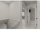 Hallway with stairs to the right and a bedroom with carpet at 111 Northdale Pl, Lawrenceville, GA 30046